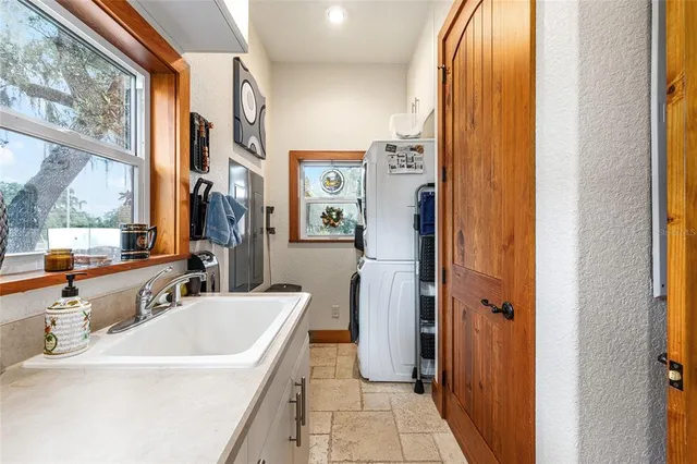 a bathroom with a toilet and a shower curtain