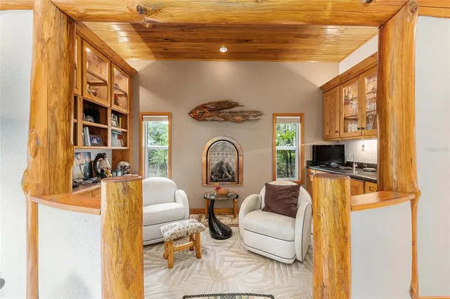 a view of a barn in the middle of a yard