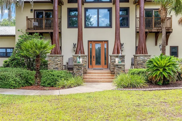 a view of a lobby with furniture and floor to ceiling window