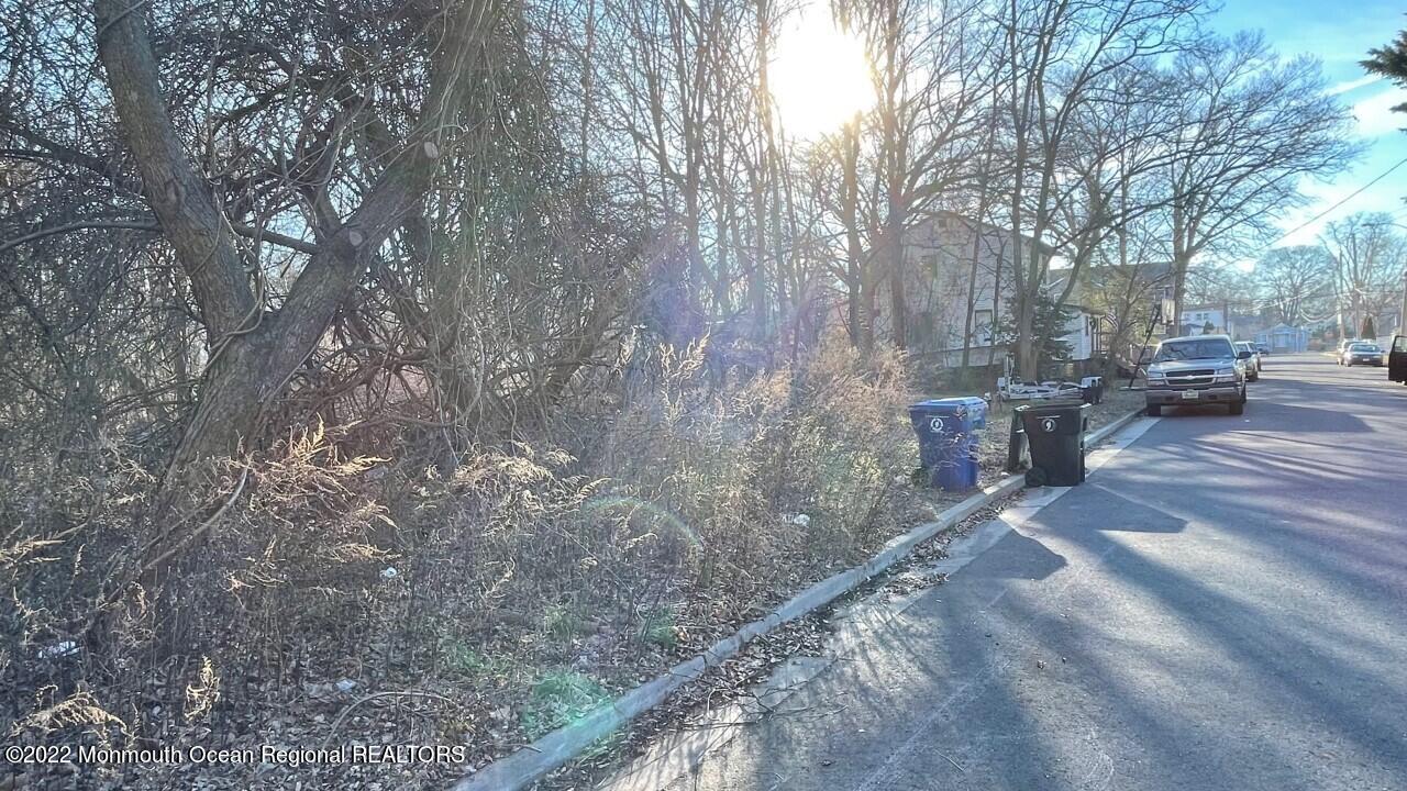 0 End Avenue Middletown, NJ 07748 - Photo 1 of 3 a backyard of a house with table and chairs