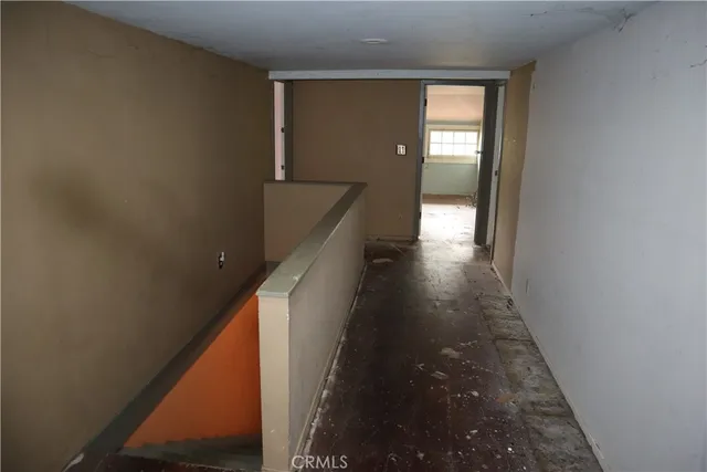 a view of an empty room and window