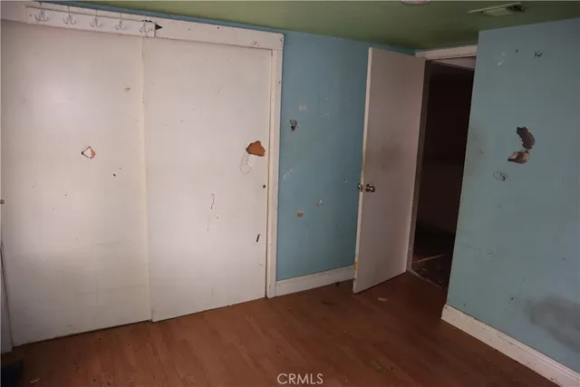 a kitchen with a sink and a refrigerator