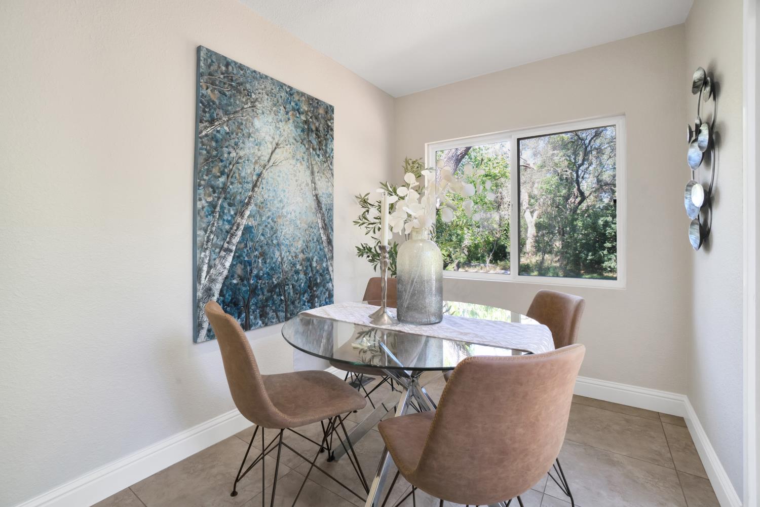 6299 Horseshoe Bar Road Loomis, CA 95650 - Photo 14 of 43 a dining room with furniture and wooden floor