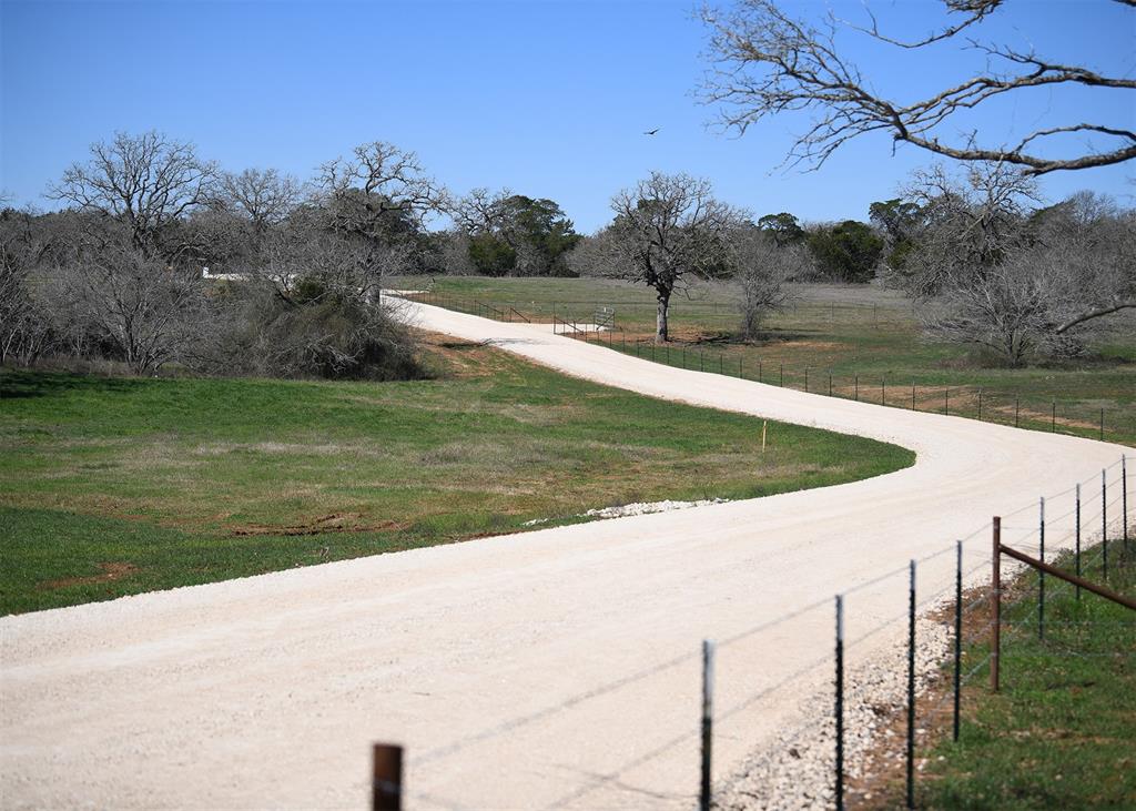 822 Main Loop Waelder, TX 78959 - Photo 7 of 7 a view of a water pond with green yard