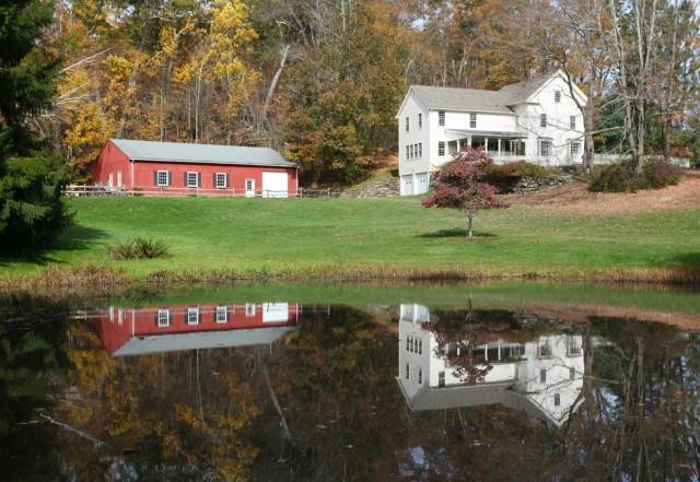 61 Moosehorn Road Roxbury, CT 06783 - Photo 1 of 1 a front view of a house with garden