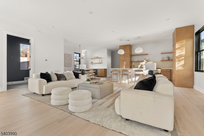 112 Valley Road, Unit B Montclair, NJ 07042 - Photo 1 of 18 a living room with furniture and a large window