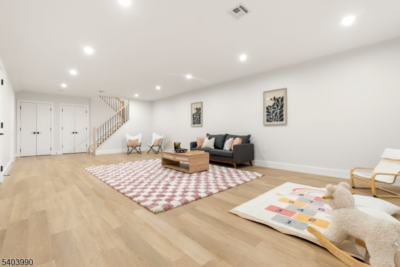 112 Valley Road, Unit B Montclair, NJ 07042 - Photo 18 of 18 a living room with furniture and a rug