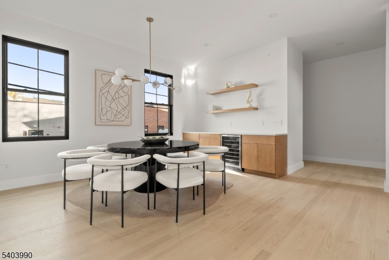 112 Valley Road, Unit B Montclair, NJ 07042 - Photo 4 of 18 a view of a dining room with furniture and window