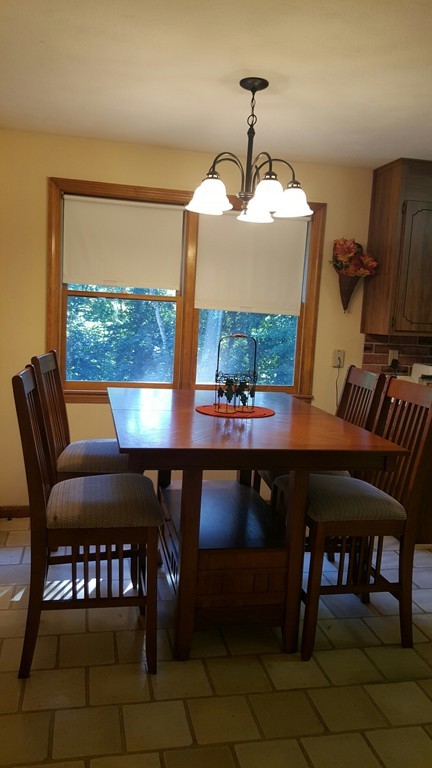 97 Bremen Street Springfield, MA 01108 - Photo 4 of 7 a view of a dining room with furniture window and outside view