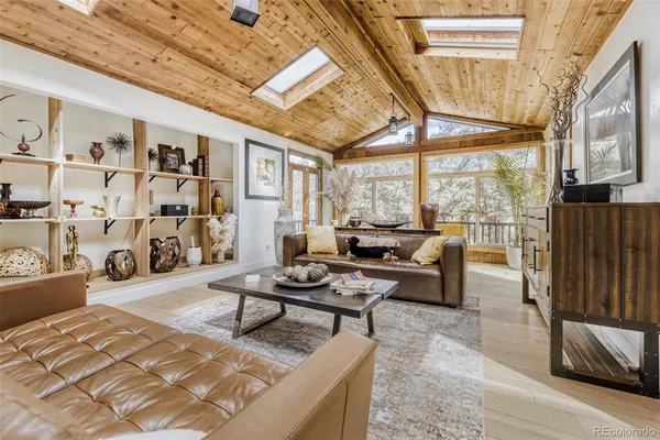a dining room with furniture window wooden floor