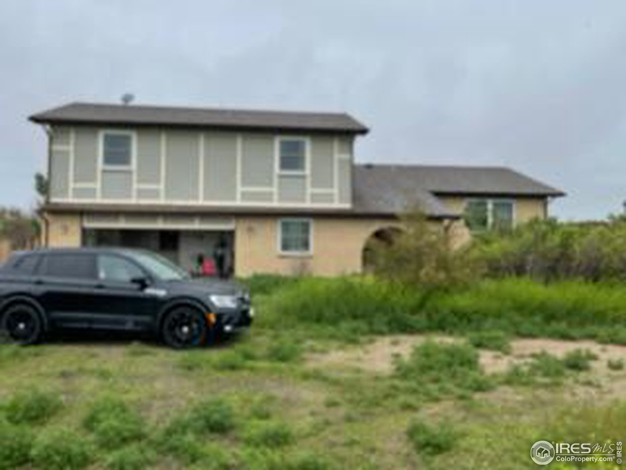 10415 North Converse Road, Unit 10415 Bennett, CO 80102 - Photo 1 of 23 Residence faces South