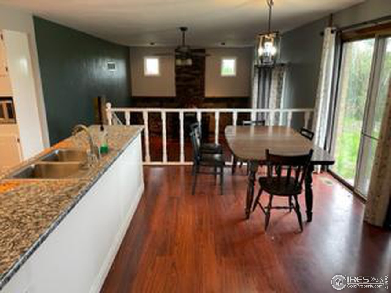 10415 North Converse Road, Unit 10415 Bennett, CO 80102 - Photo 12 of 23 Dining Room adjacent to Kitchen