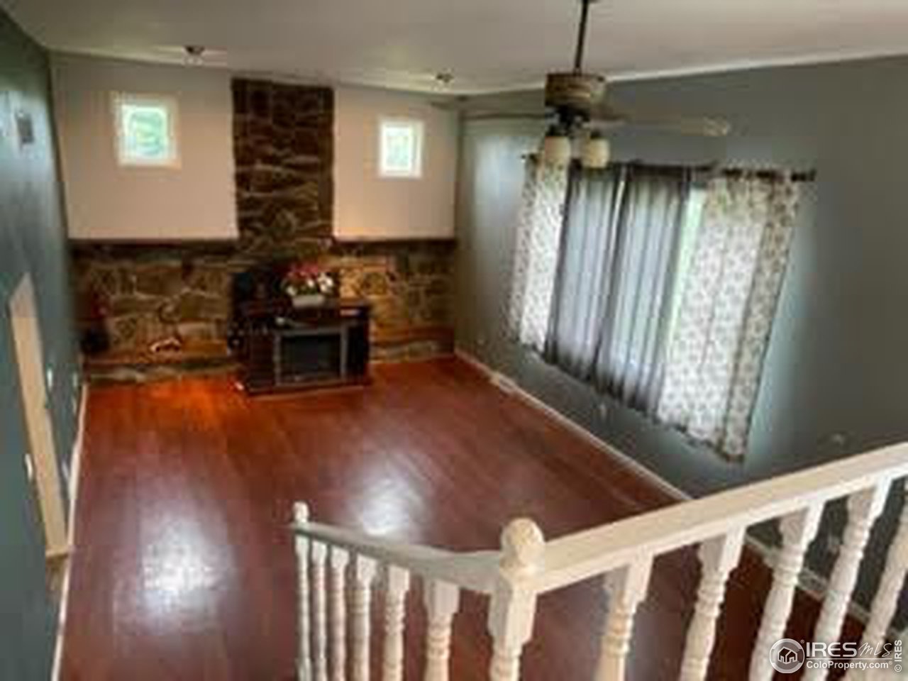 10415 North Converse Road, Unit 10415 Bennett, CO 80102 - Photo 6 of 23 Great Room with Firplace