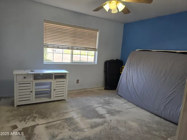 a view of a closet area with en suite bathroom