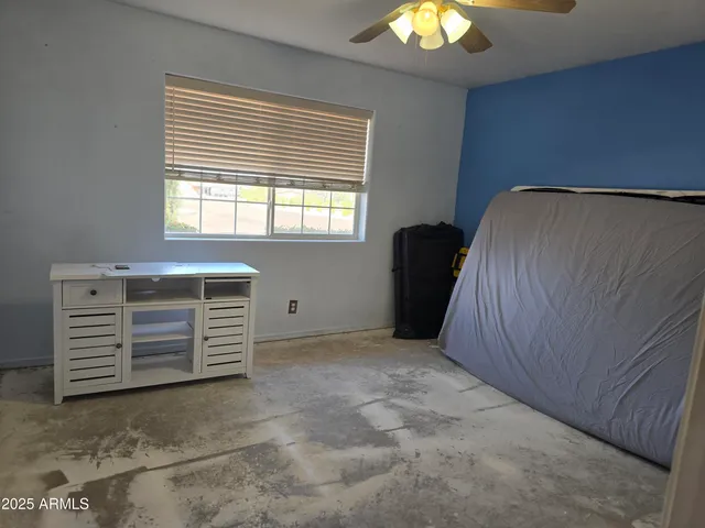 a view of a closet area with en suite bathroom
