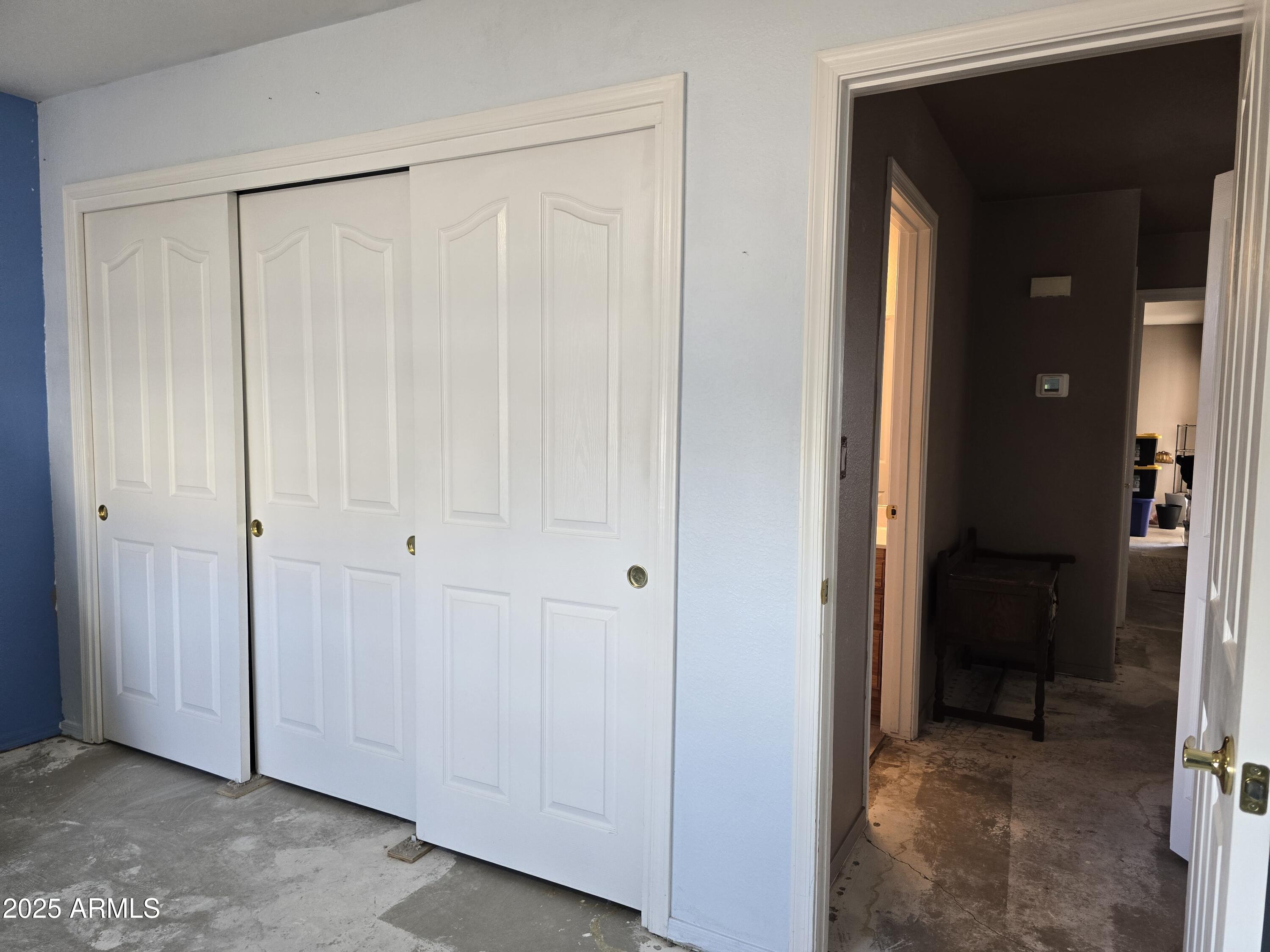 924 West Sahuaro Road Pearce, AZ 85625 - Photo 17 of 32 a view of a closet area with en suite bathroom