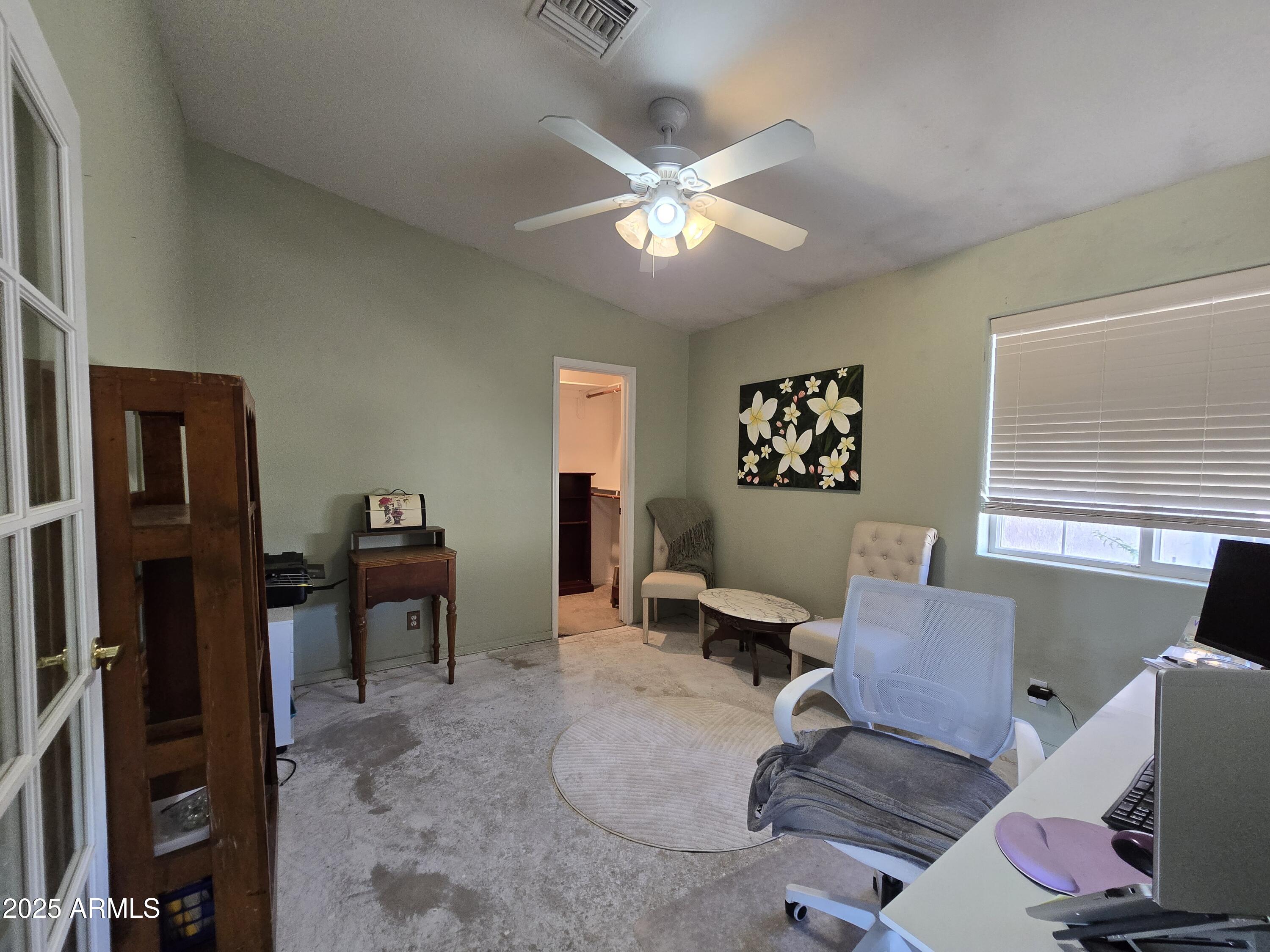 924 West Sahuaro Road Pearce, AZ 85625 - Photo 19 of 32 a living room with furniture and a window