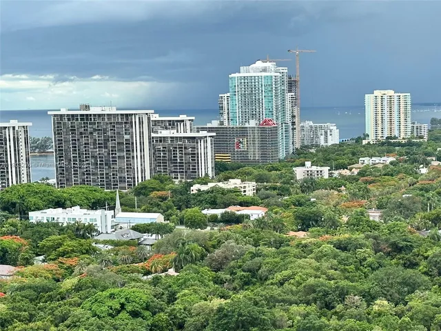 a view of a city that has tall buildings