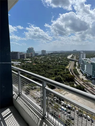 a view of city from a balcony