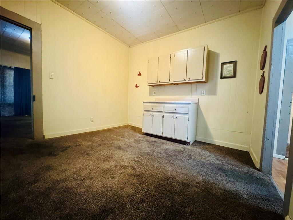 112 Cemetery Street Kingston, GA 30145 - Photo 11 of 28 a view of a kitchen with white cabinets