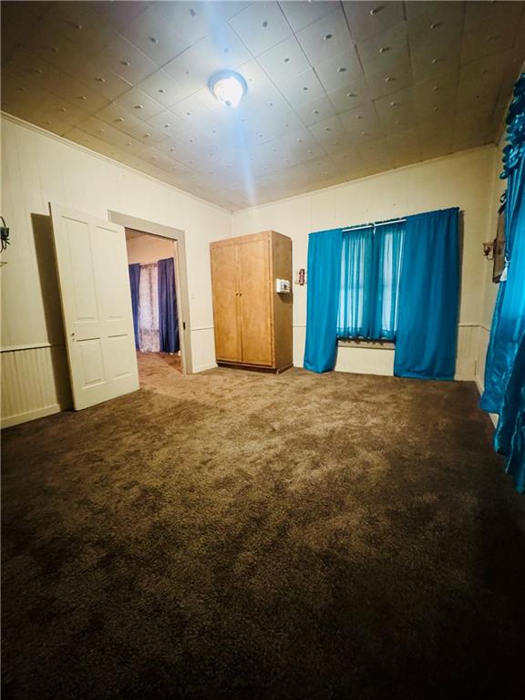 112 Cemetery Street Kingston, GA 30145 - Photo 16 of 28 a large room with closet and wooden floor