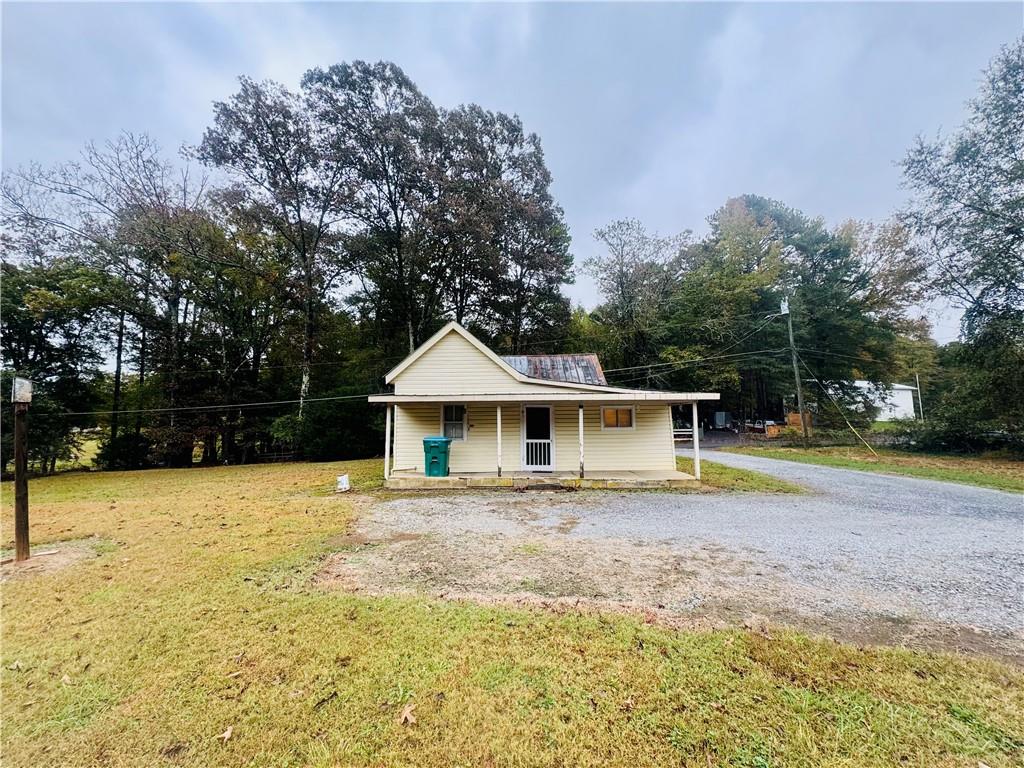 112 Cemetery Street Kingston, GA 30145 - Photo 20 of 28 a front view of a house with pool