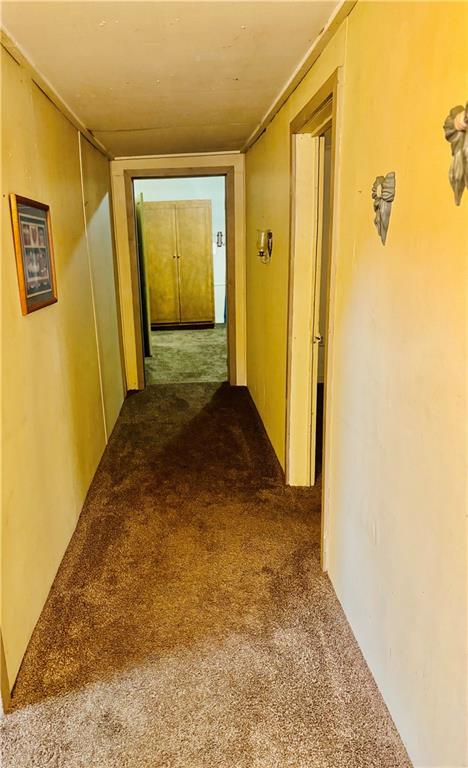 112 Cemetery Street Kingston, GA 30145 - Photo 5 of 28 a view of a big room with closet and wooden floor