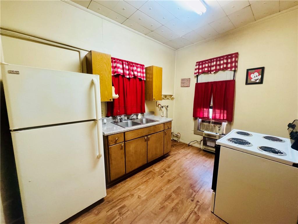 112 Cemetery Street Kingston, GA 30145 - Photo 9 of 28 a view of kitchen with a refrigerator and a stove