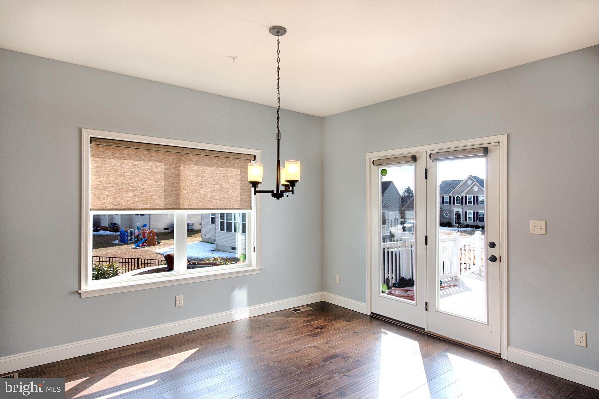 293 Henderson Road Bel Air, MD 21014 - Photo 12 of 43 Dbl drs to deck, hrd scaped patio, & fenced yard