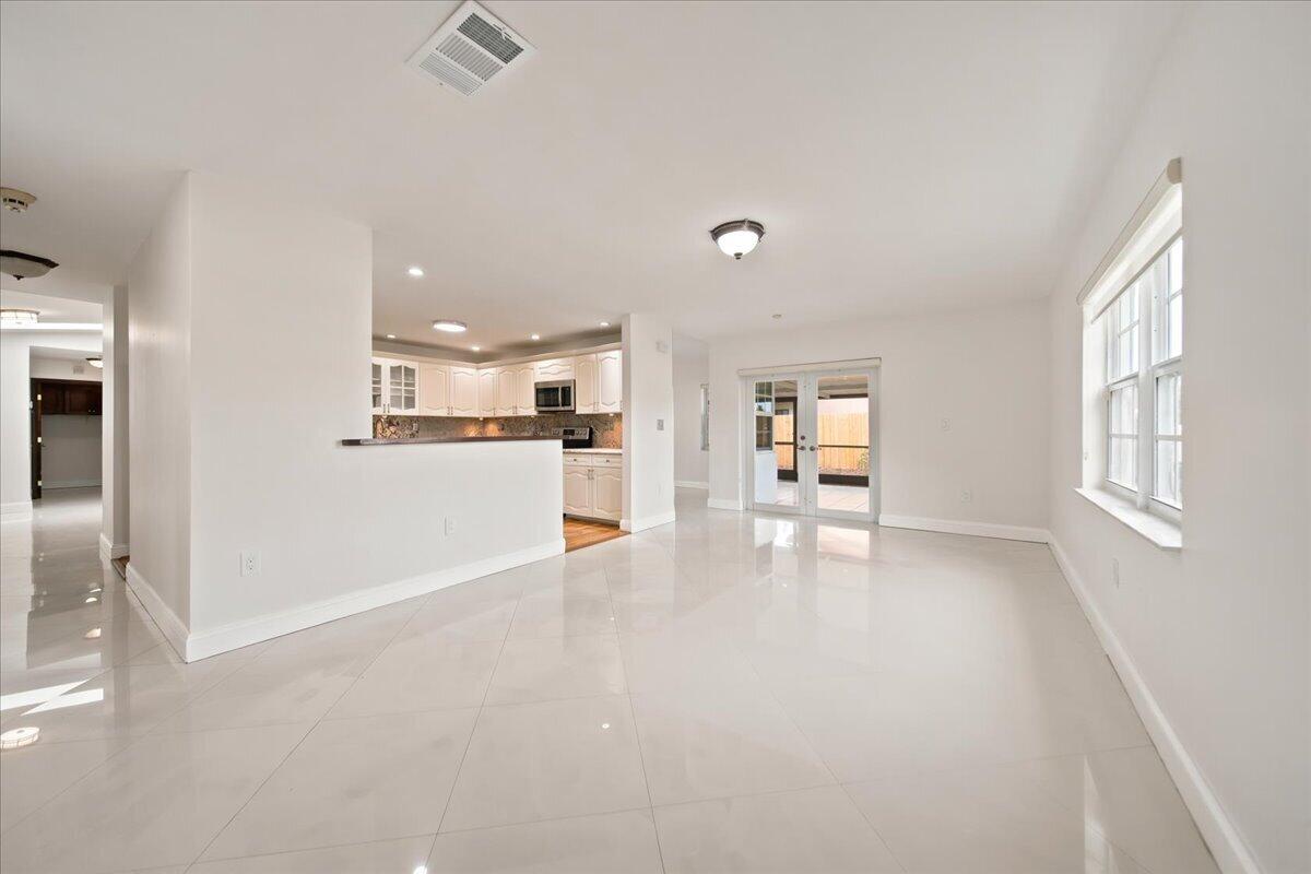 20009 Northwest 66th Place Hialeah, FL 33015 - Photo 11 of 33 a view of a kitchen with furniture and wooden floor