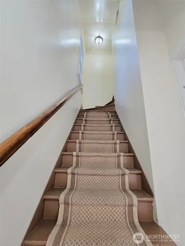 a dining room with furniture window wooden floor