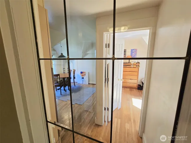 a bedroom with bed and a window