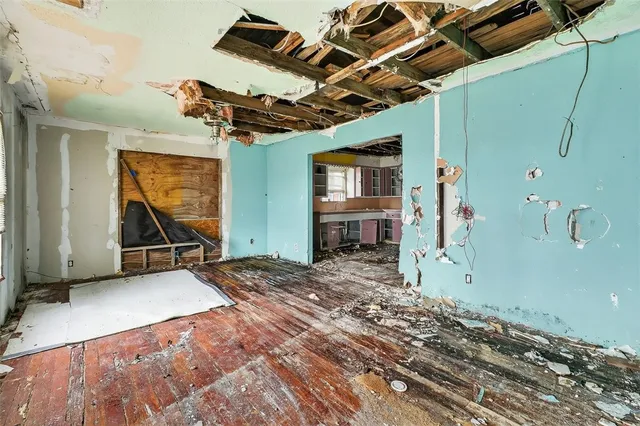 a view of a livingroom with wooden floor