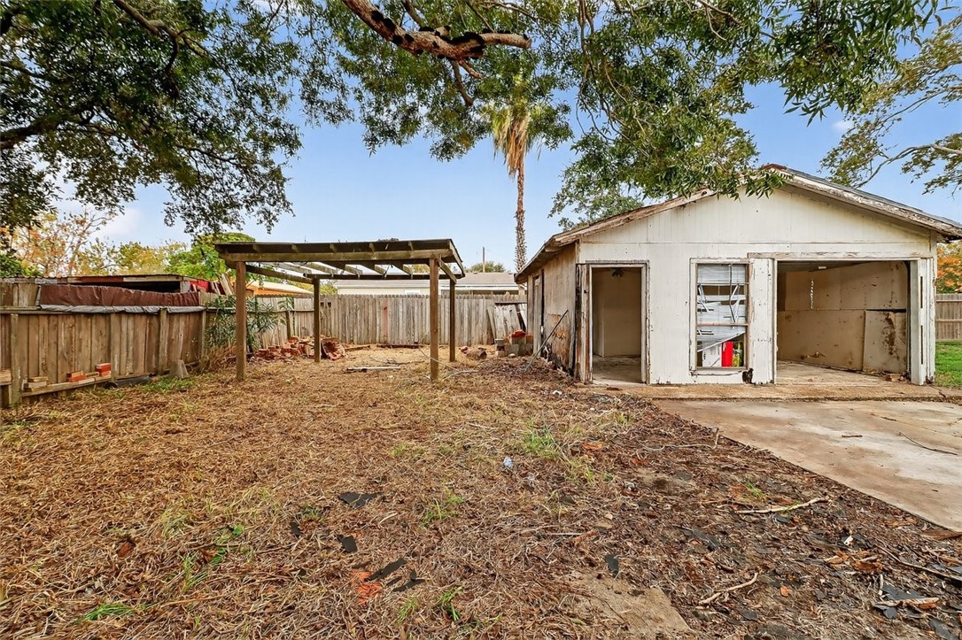 1930 Sandy Way Corpus Christi, TX 78418 - Photo 22 of 35 a view of a house with a yard