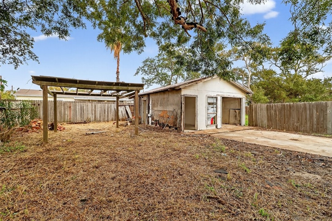 1930 Sandy Way Corpus Christi, TX 78418 - Photo 23 of 35 a front view of a house with a garden