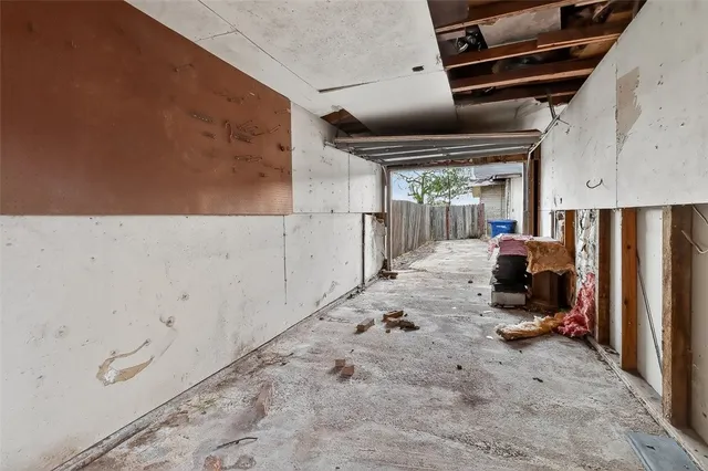 a view of a door and a window