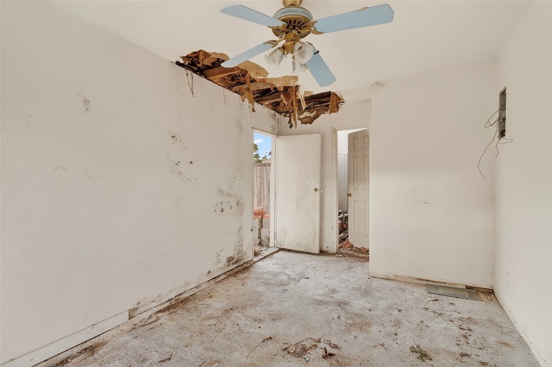 1930 Sandy Way Corpus Christi, TX 78418 - Photo 29 of 35 a view of a chandelier fan and a window