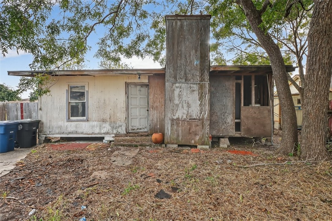 1930 Sandy Way Corpus Christi, TX 78418 - Photo 32 of 35 a view of a house with a yard and tree