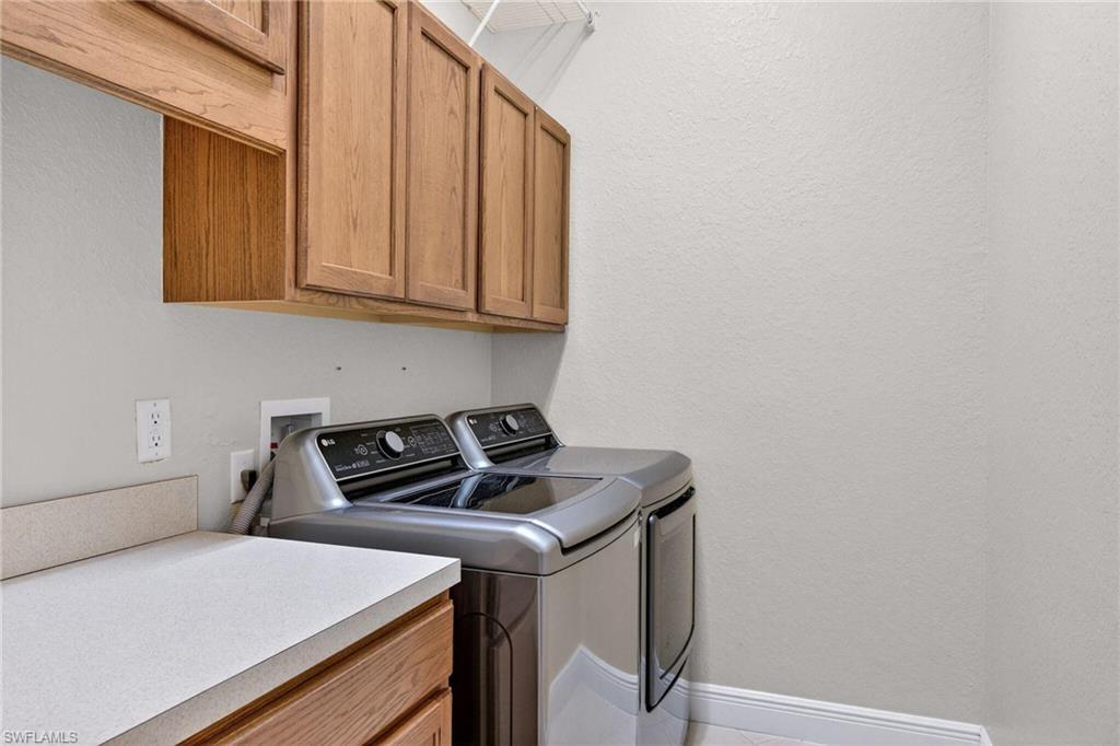 2212 Vardin Place Naples, FL 34120 - Photo 38 of 50 a room with storage and utility