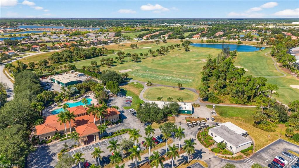 2212 Vardin Place Naples, FL 34120 - Photo 49 of 50 an aerial view of residential houses with outdoor space