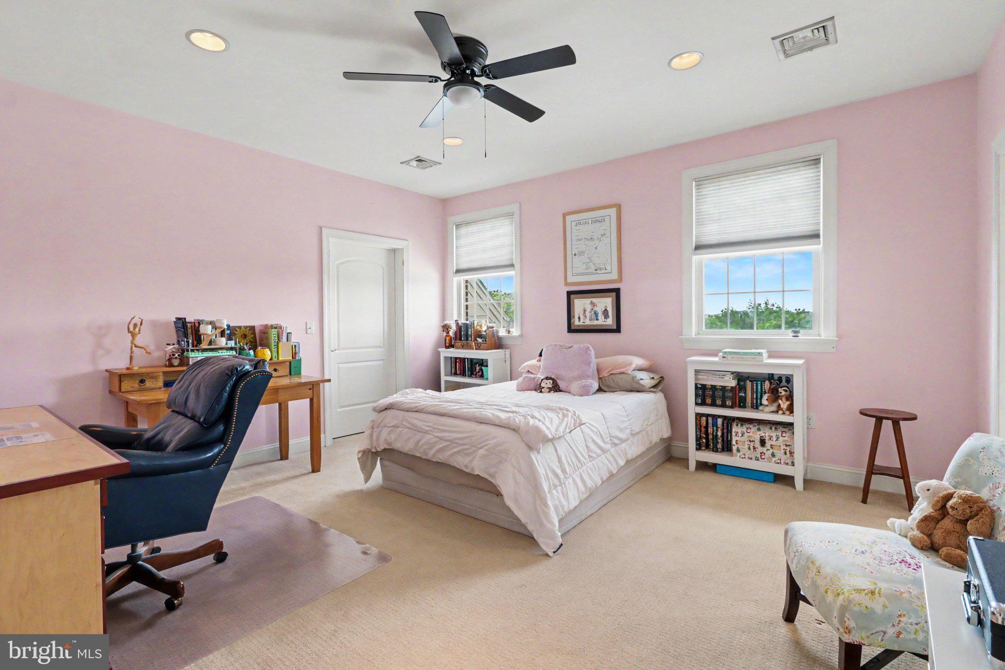 1080 Swatara Road Hershey, PA 17033 - Photo 34 of 59 a bedroom with a bed gym equipment and a desk