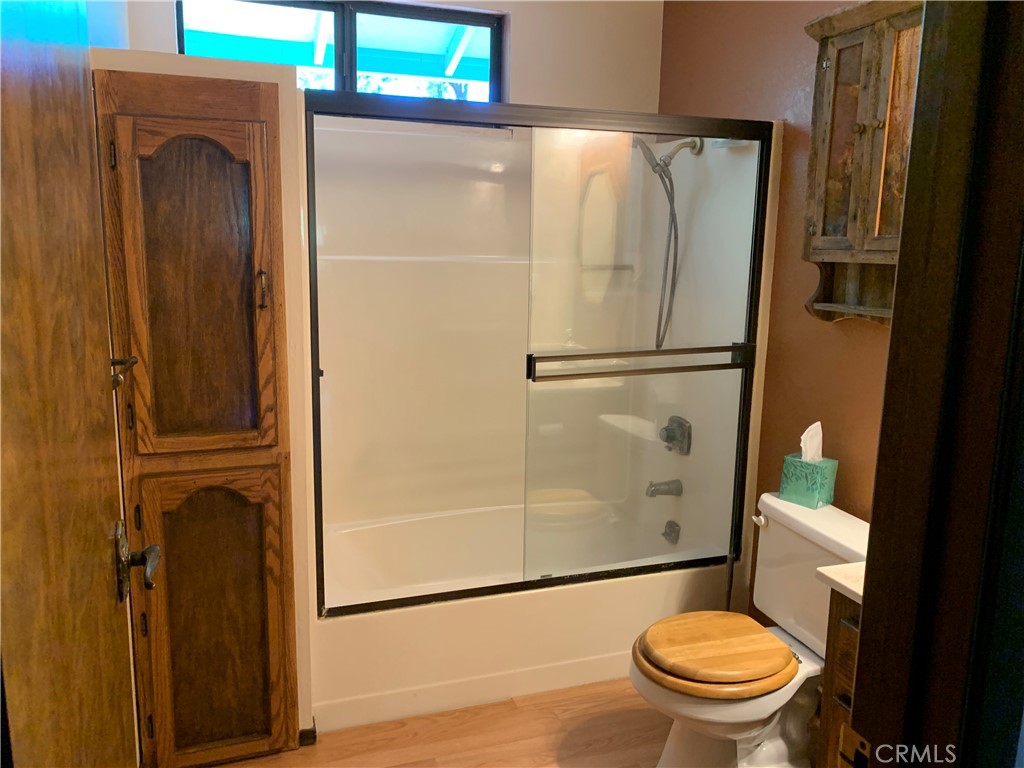 18683 Morgan Valley Road Lower Lake, CA 95457 - Photo 12 of 16 a bathroom with a toilet and a shower