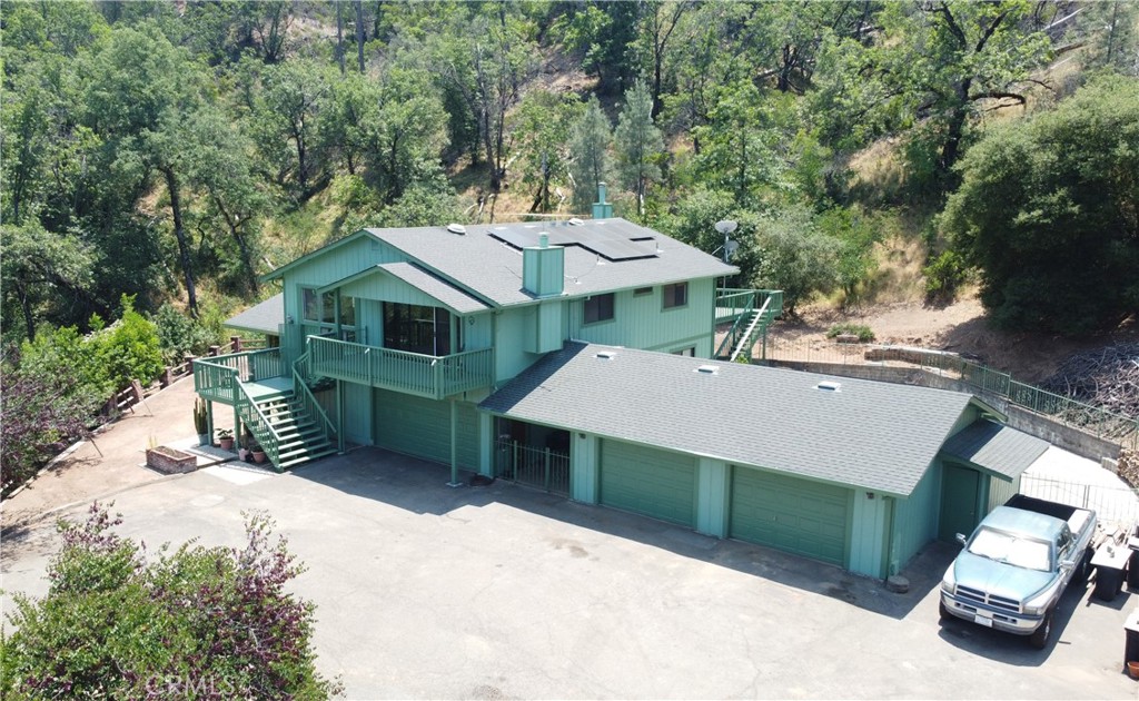 18683 Morgan Valley Road Lower Lake, CA 95457 - Photo 15 of 16 an aerial view of a house with a garden