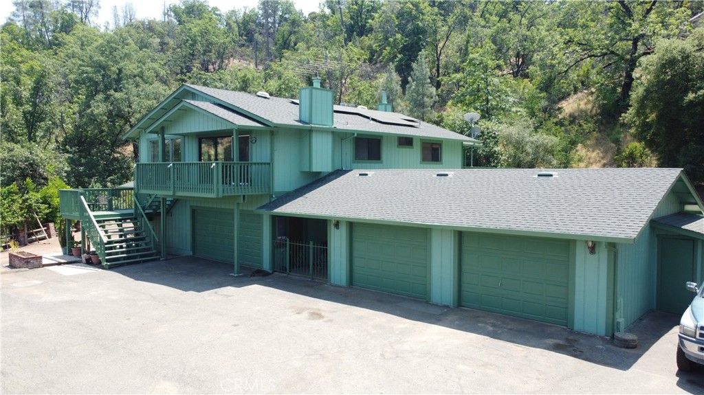 18683 Morgan Valley Road Lower Lake, CA 95457 - Photo 16 of 16 a front view of a house with a garden