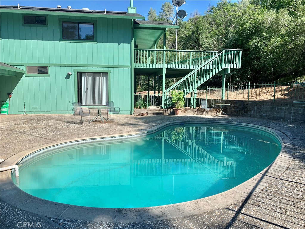 18683 Morgan Valley Road Lower Lake, CA 95457 - Photo 4 of 16 a view of a swimming pool with a patio