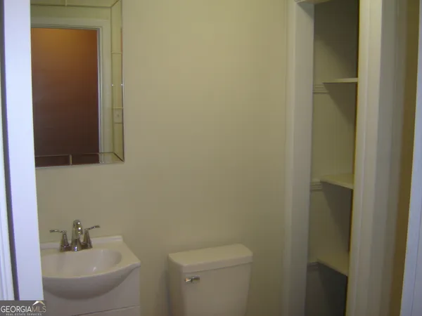 a bathroom with a sink and a toilet