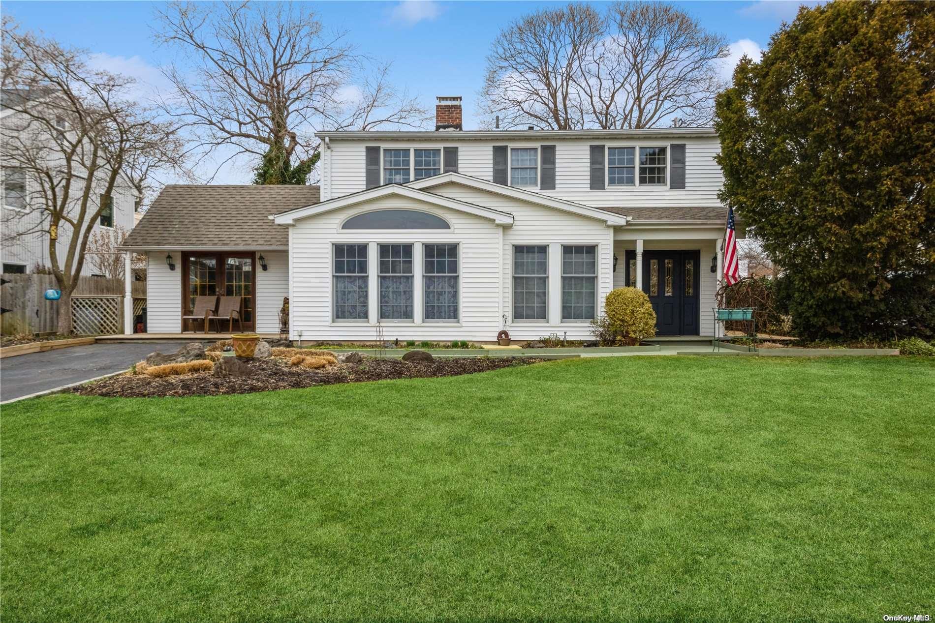 23 Target Lane Levittown, NY 11756 - Photo 1 of 1 Front View set back form street