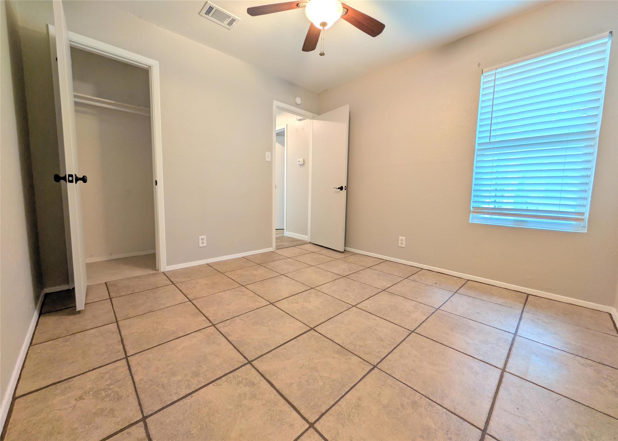 12601 Turtle Rock Road, Unit B Austin, TX 78729 - Photo 14 of 20 Bedroom 3 is on back center of the hallway.