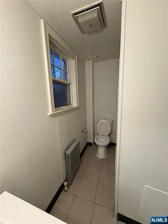 a bathroom with a toilet