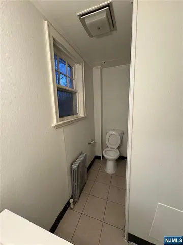 a bathroom with a toilet